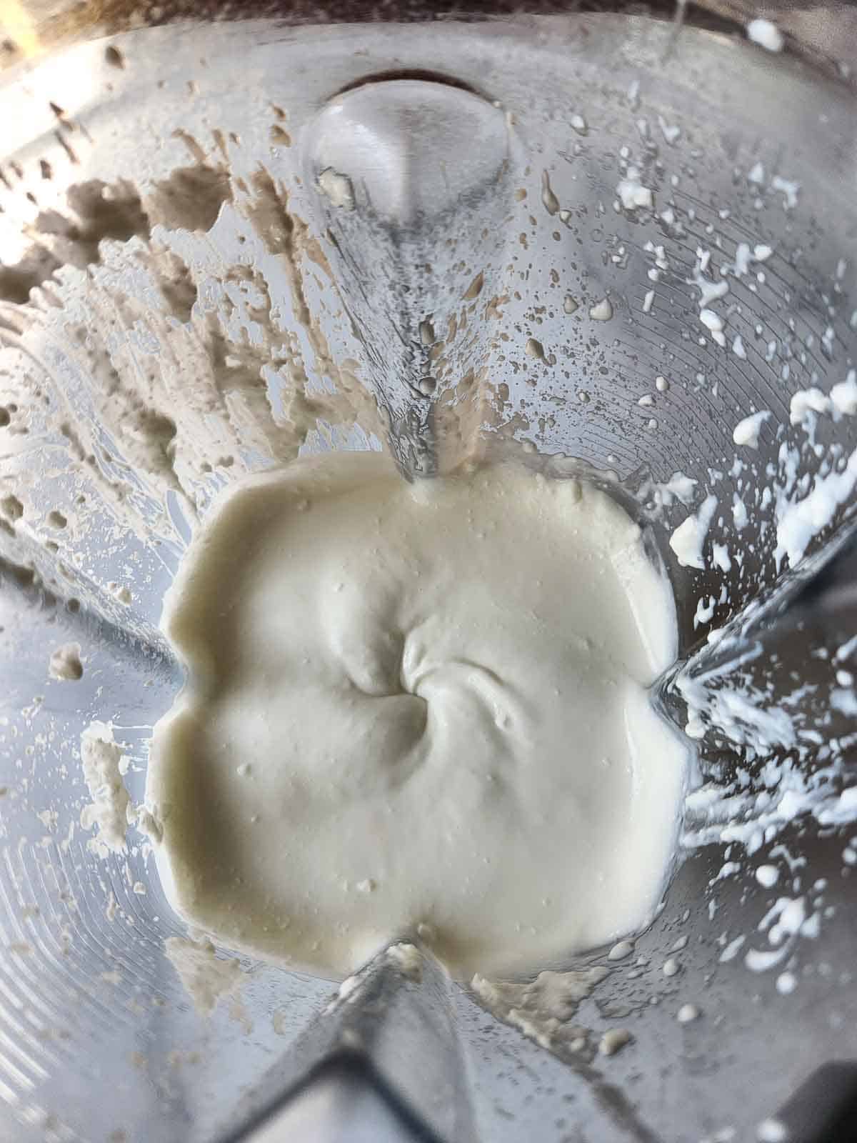 Cottage cheese in a blended that has been whipped.