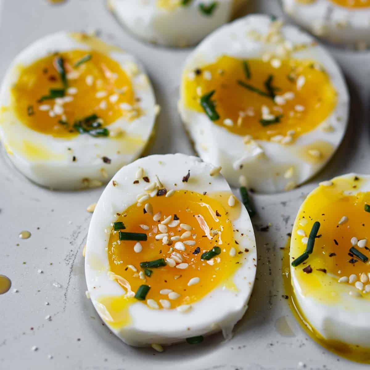 https://brunchandbatter.com/wp-content/uploads/2021/05/jammy-eggs-with-sesame-oil-FI.jpg
