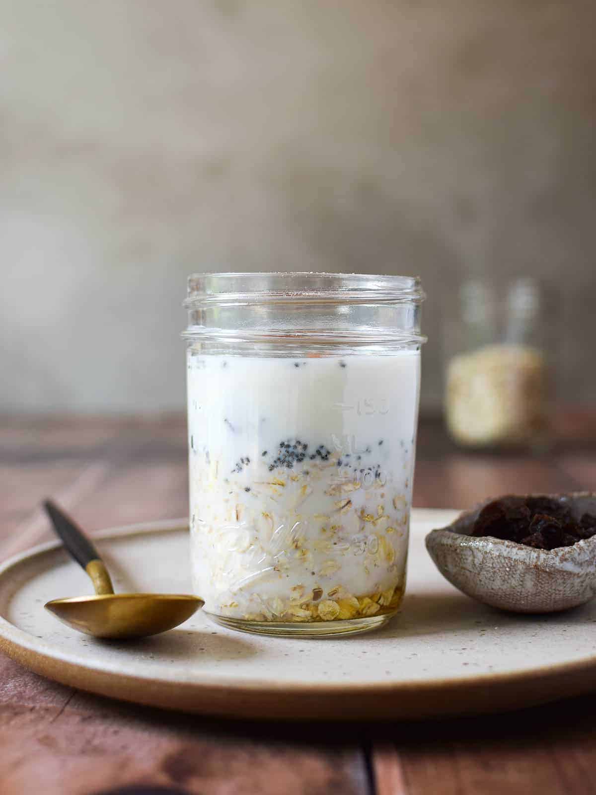 Overnight oats are prepared before going into the refrigerator.