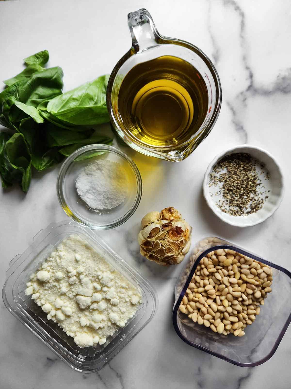 Ingredients for roasted garlic pesto sauce.