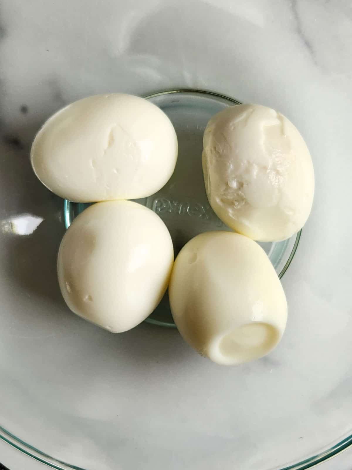 Hard-boiled eggs in a bowl.