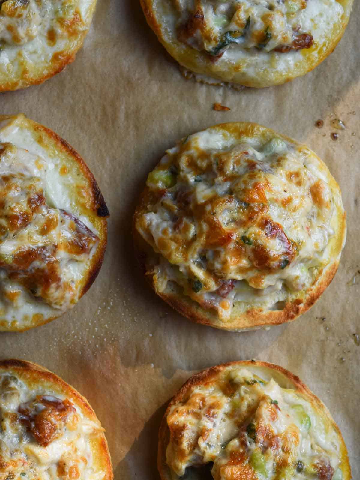 Tuna melt on brown parchment paper.