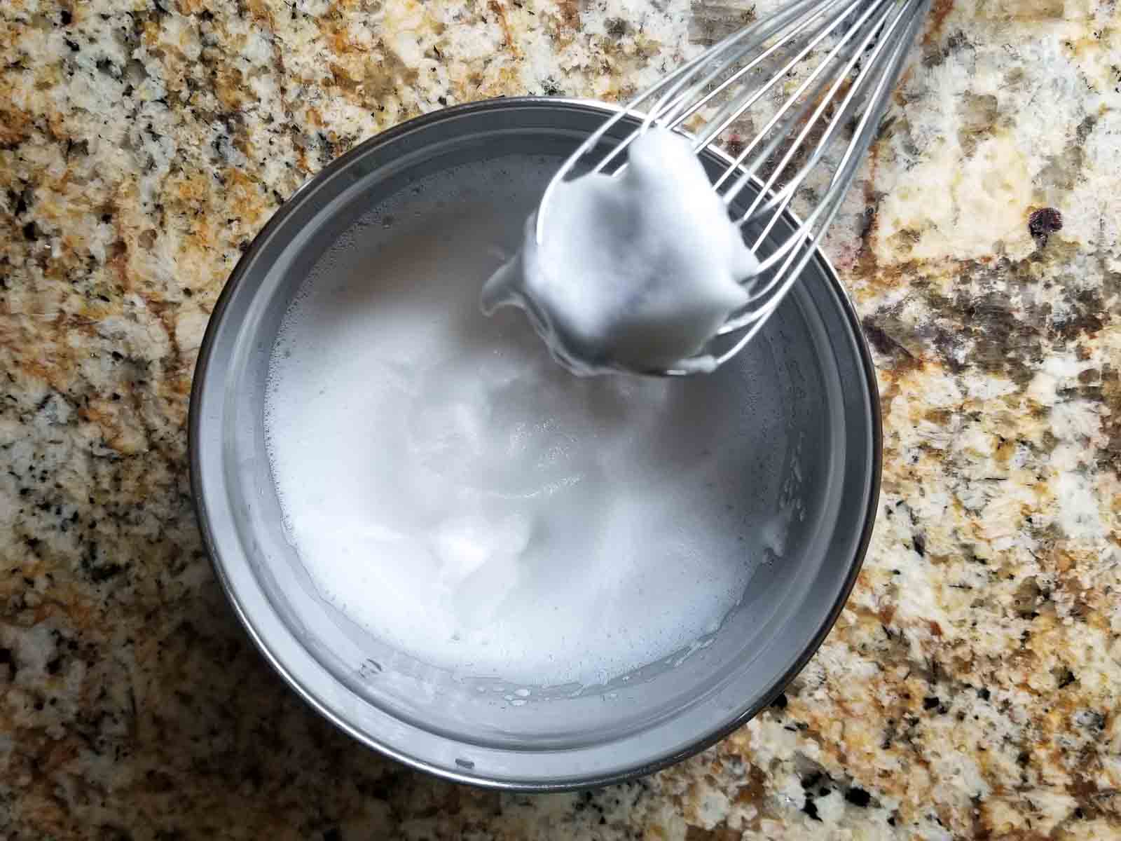 Ingredient picture of whipped egg whites for the pumpkin waffle batter.
