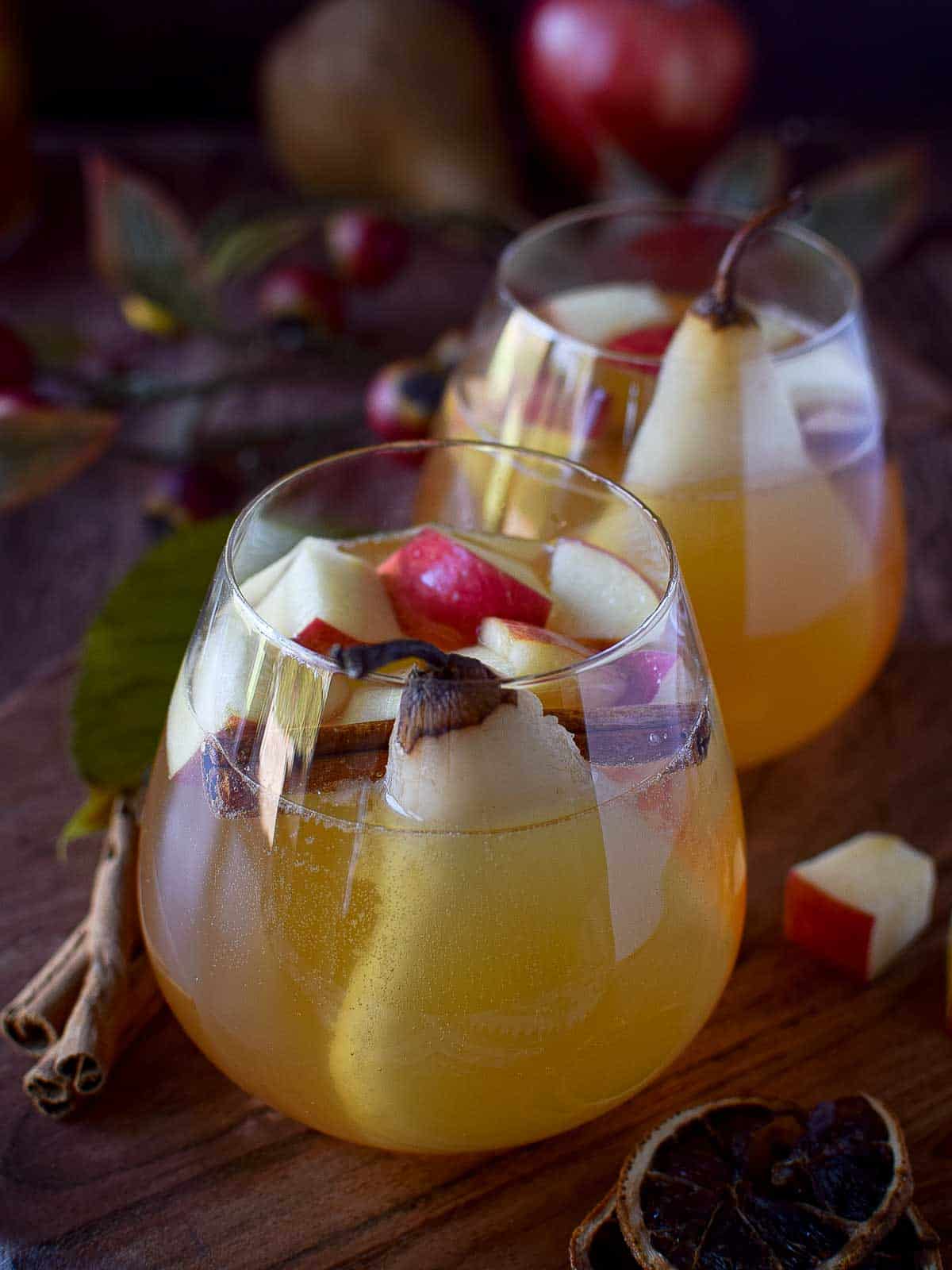 Close-up of two glasses of apple and pear sangria.
