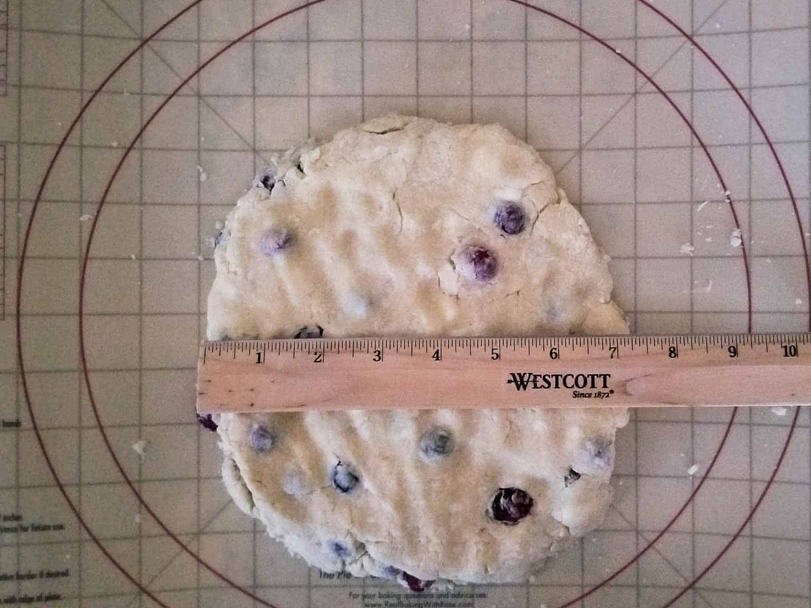 Measuring dough for scones.