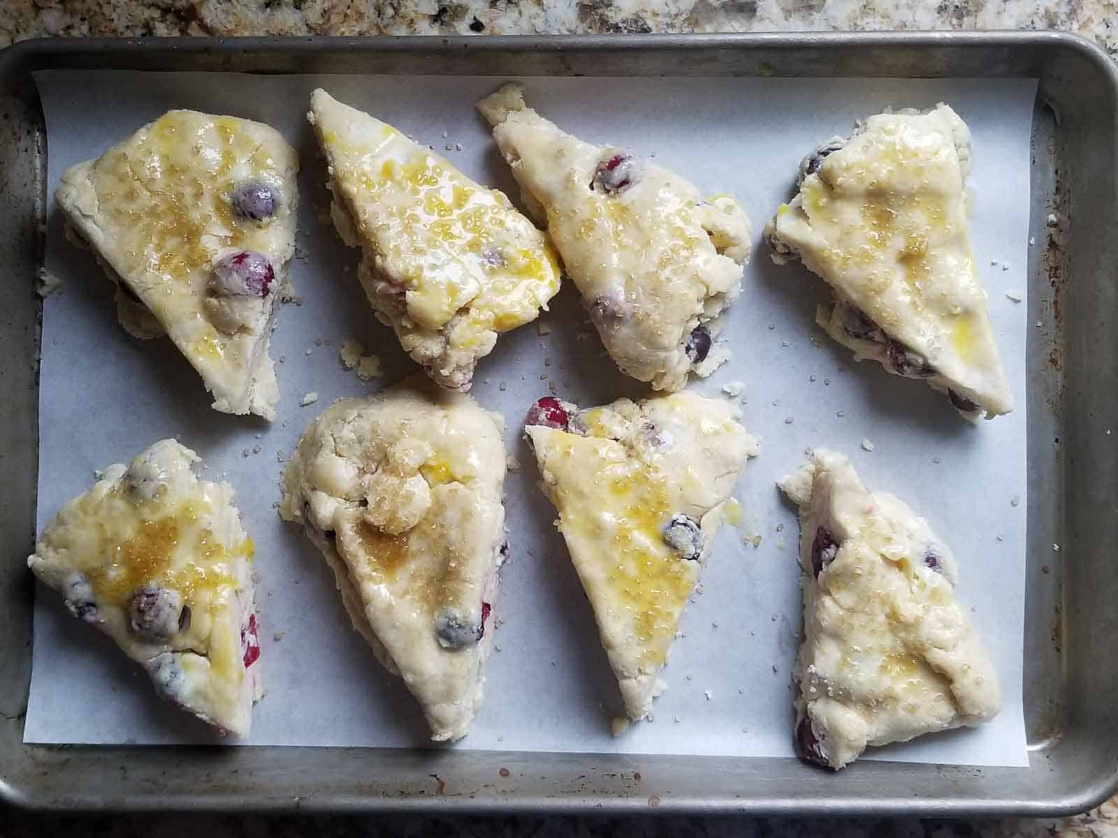 Cut scones on a baking sheet brushed with egg wash.