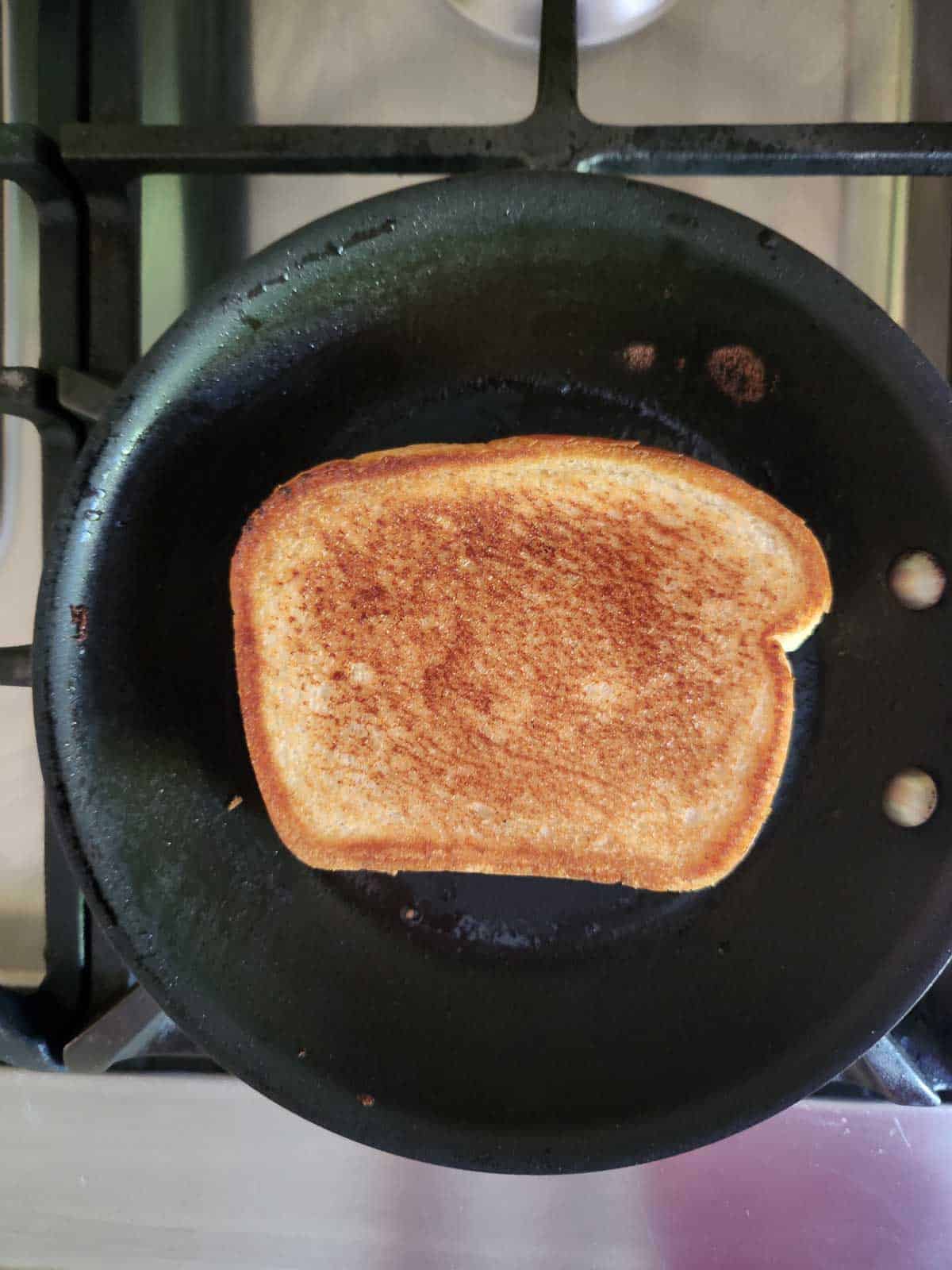 Fried sandwich in a pan.