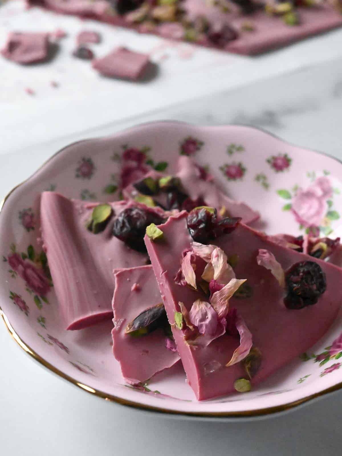 Ruby chocolate bark in a pick flower bowl.