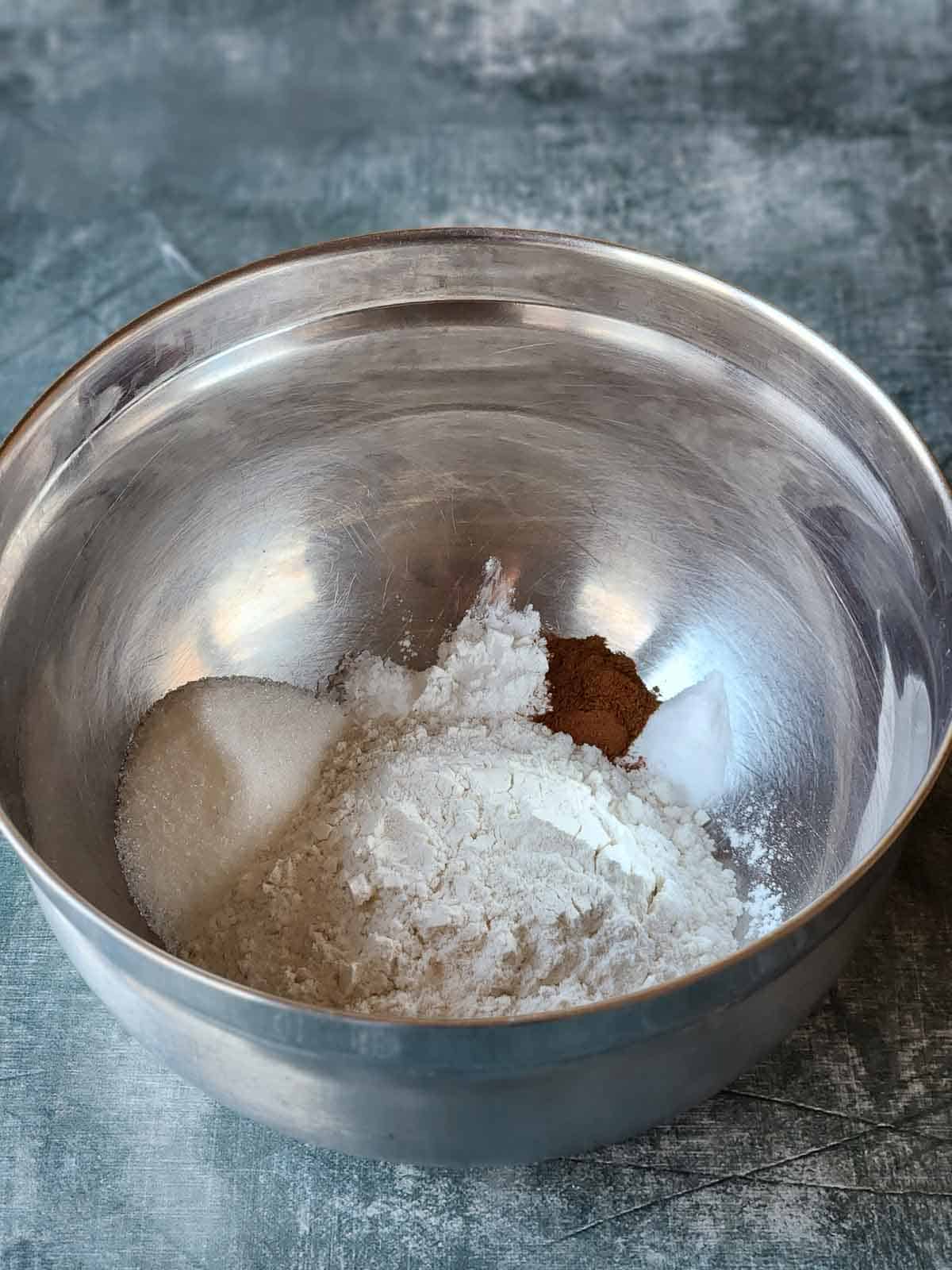 Dry ingredients in a bowl for sweet cream pancakes.