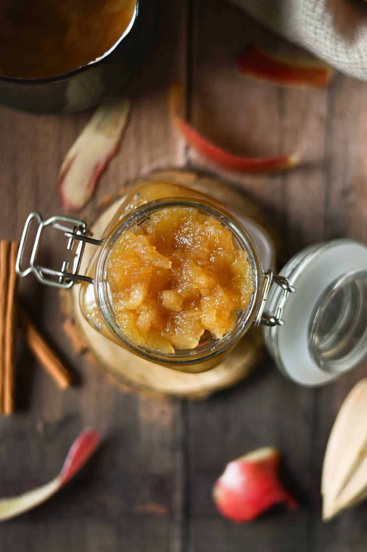 Top view of applesauce in a clear jar.