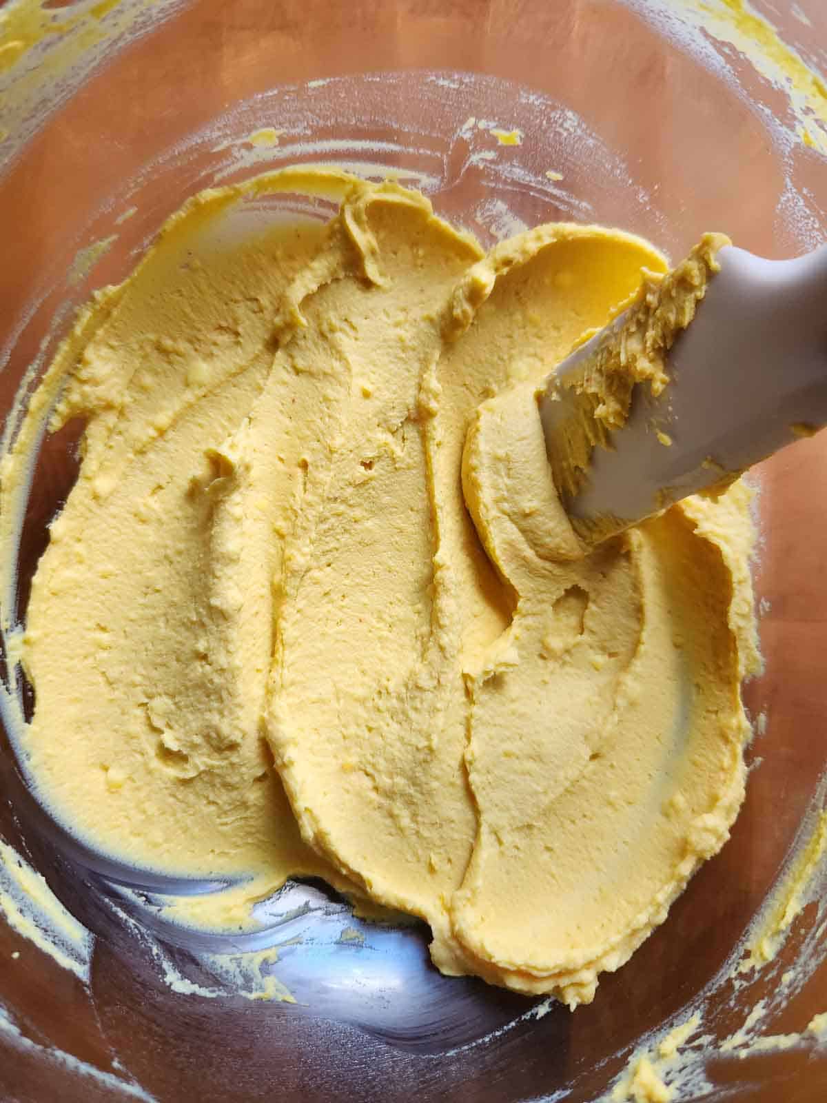 Fluffy filling for deviled eggs in a clear bowl.