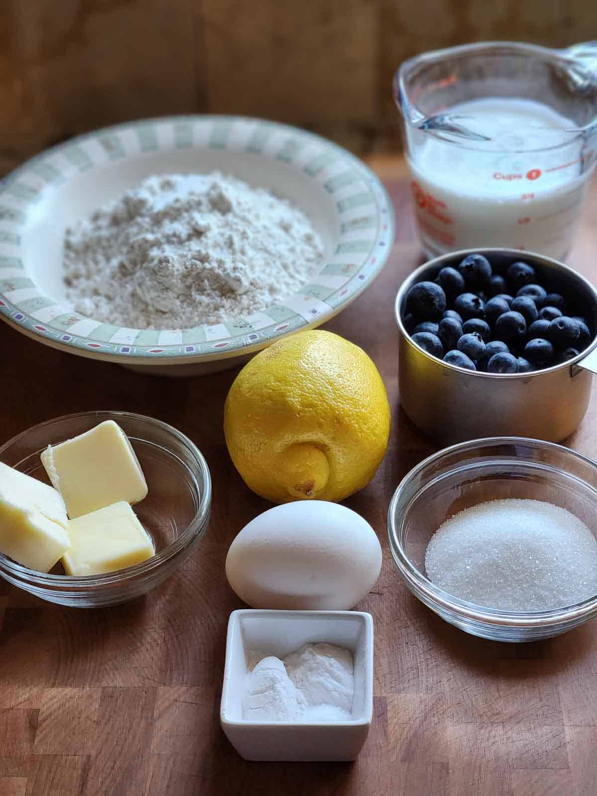 Ingredients for a blueberry skillet pancake on a cutting board.