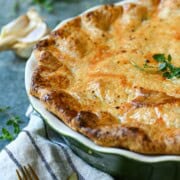 Close up of chicken pot pie showing a golden crust.
