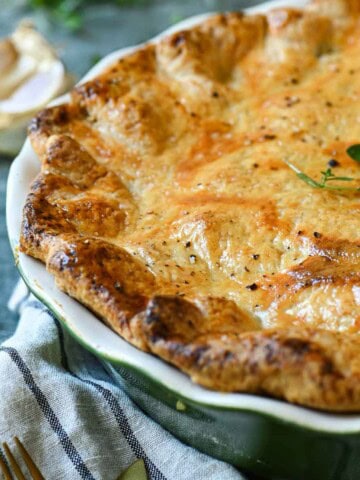 Close up of chicken pot pie showing a golden crust.