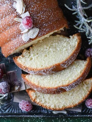 Overhead of 3 slices of Scandinavian cake on a meatal tray.