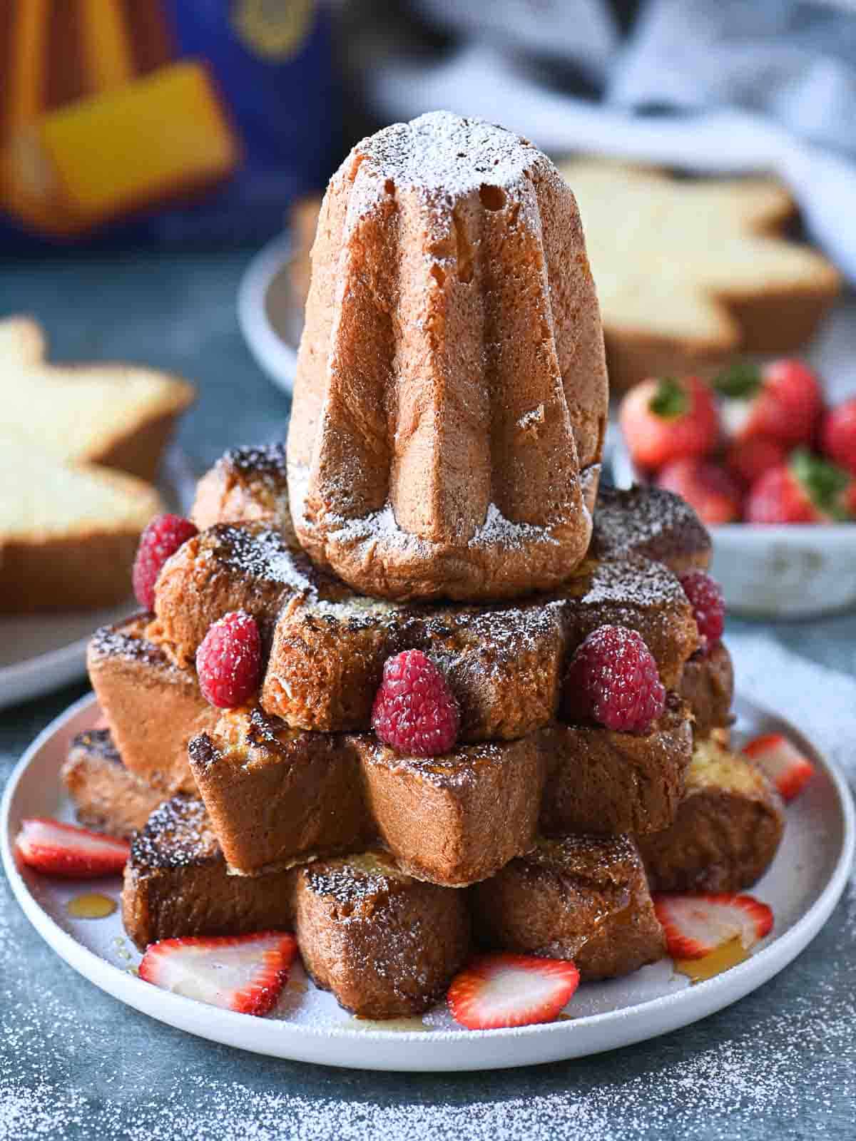A stack of pandoro French toast arranged like a Christmas tree.