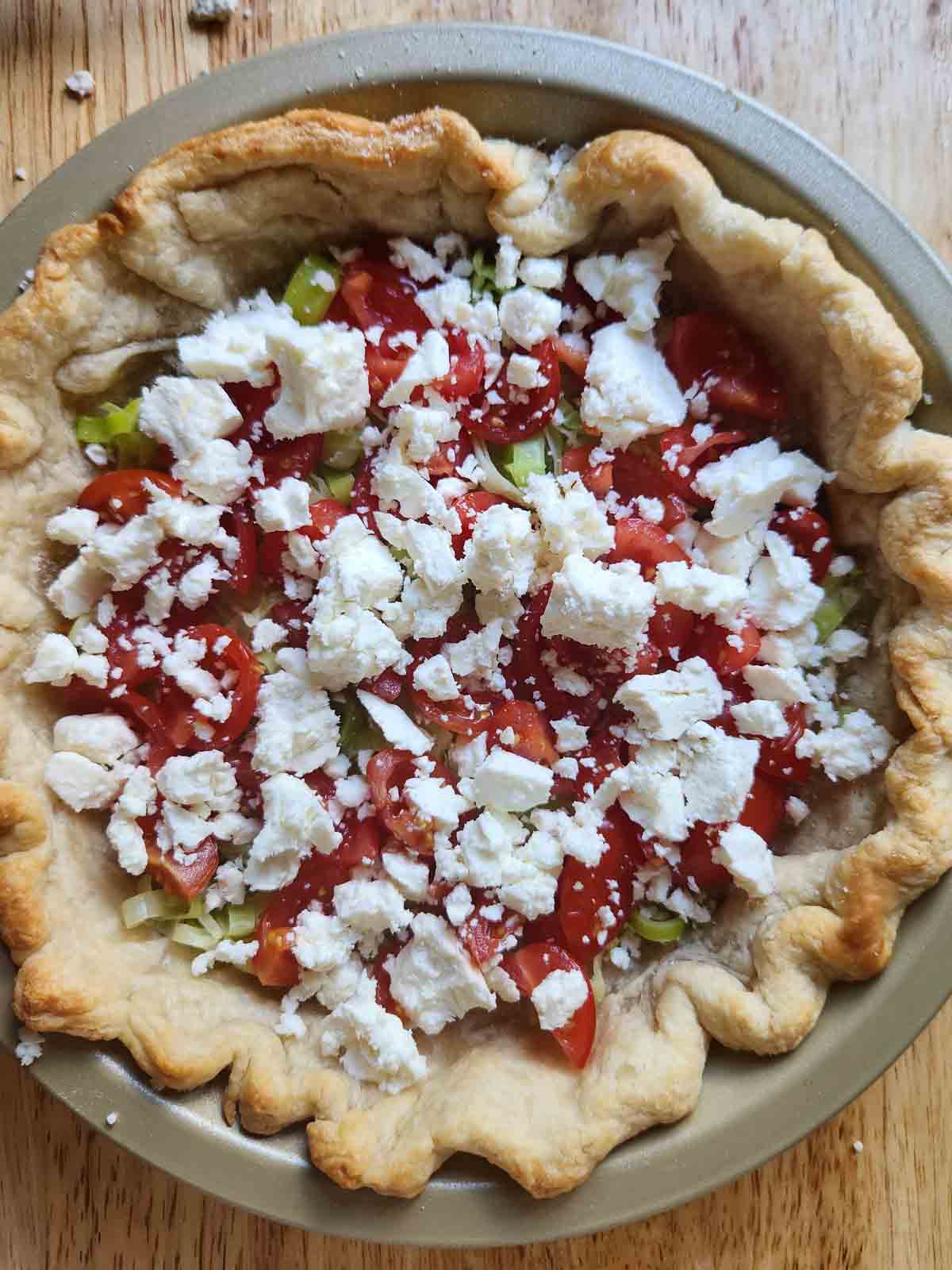 Feta and veggies in a quiche crust.