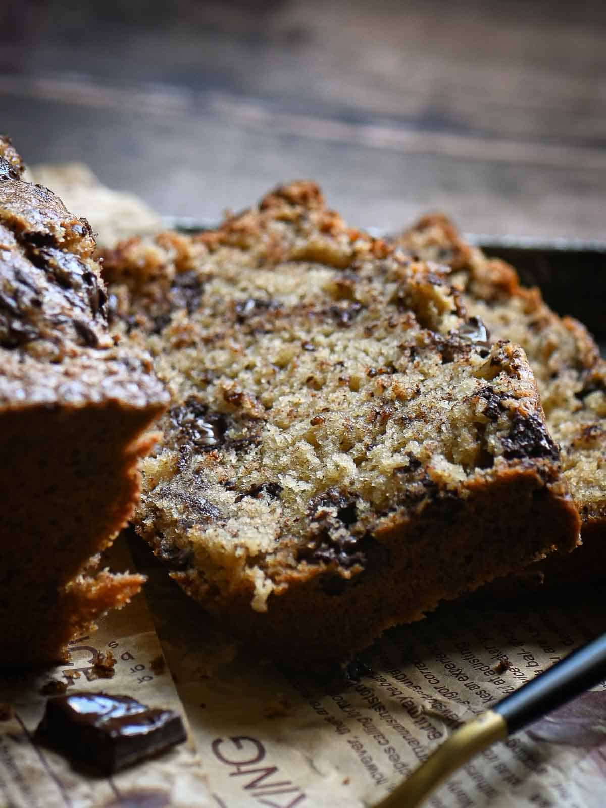 Close-up of chocolate loaf cake showing the melted chocolate chips.