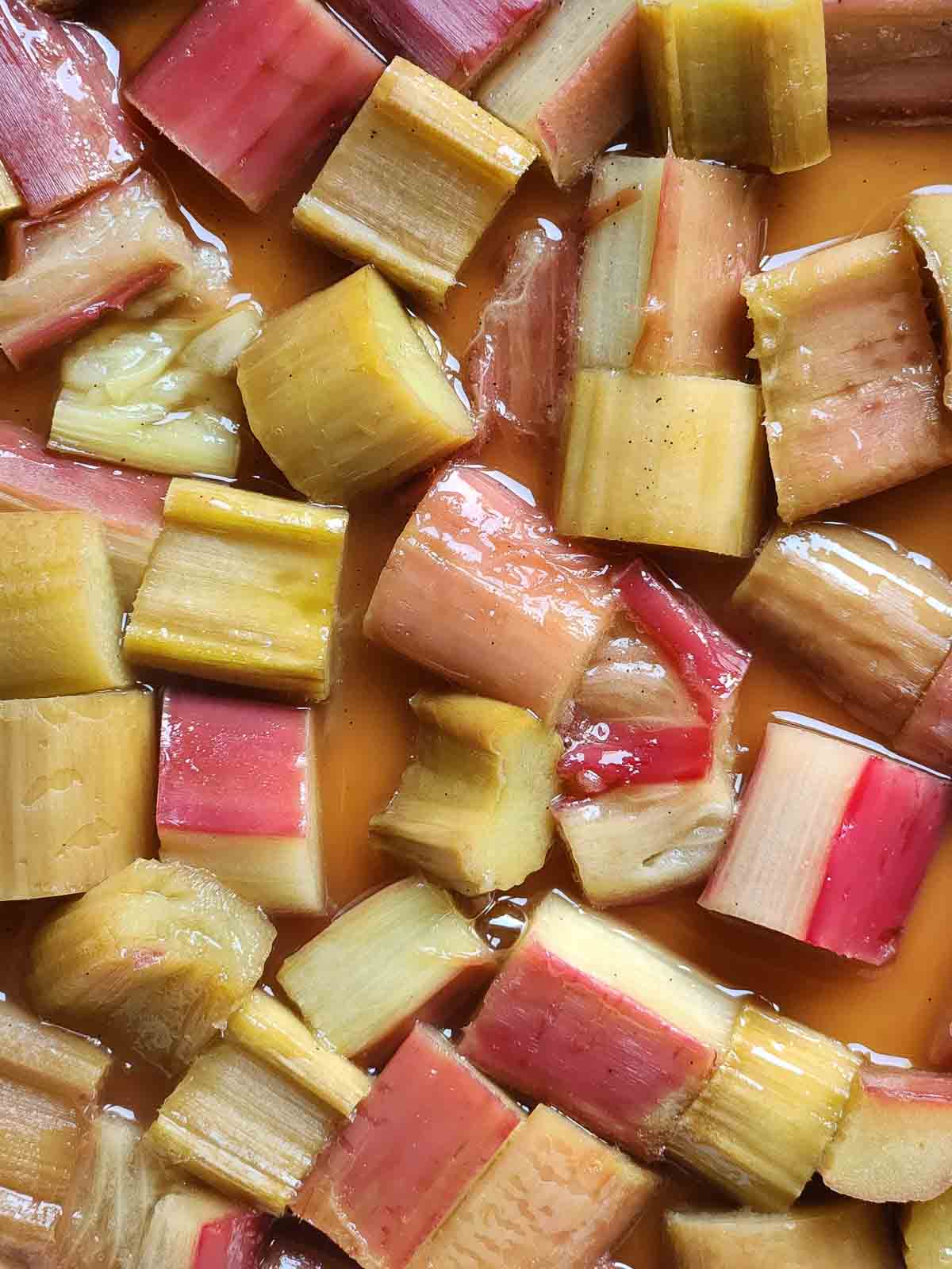 Overhead of cooked, jammy rhubarb in a pan.