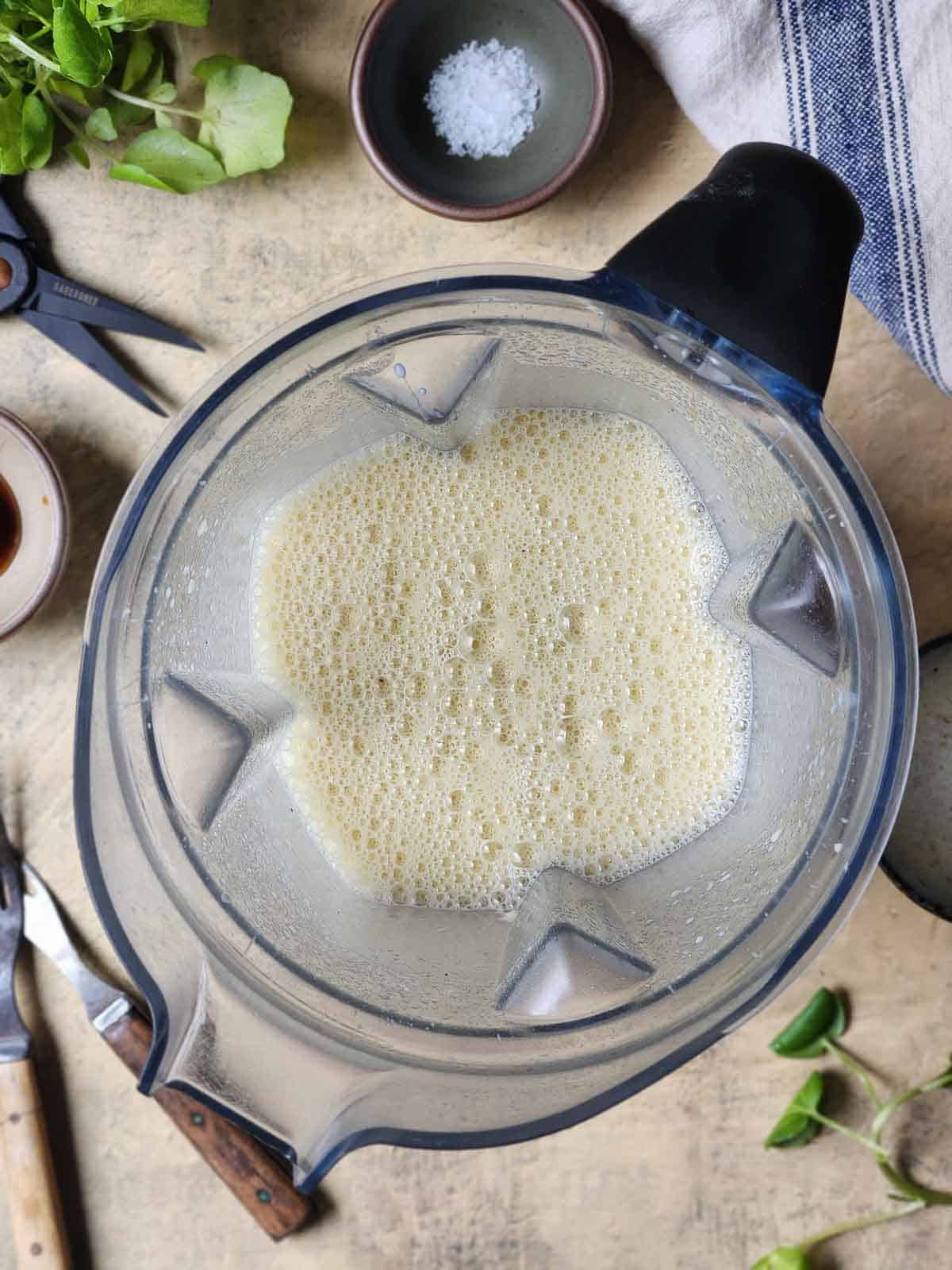 Overhead of Dutch baby batter in a blender.