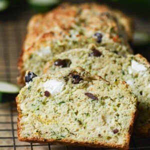 Slices of zucchini bread leaning up against each other.